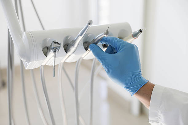 Professional Tooth Extraction technician working in Sandoval, IL